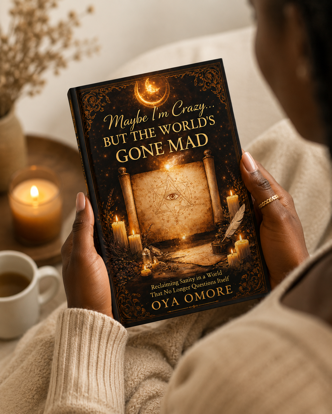 Maybe I’m Crazy… But the World’s Gone Mad held in a Black woman’s hands